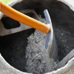 Construction,Site.,Adding,Lime,,Sand,And,Stones,To,Rotating,Cement