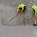 Plasterer,Laying,Concrete,Cement,With,Trowel.