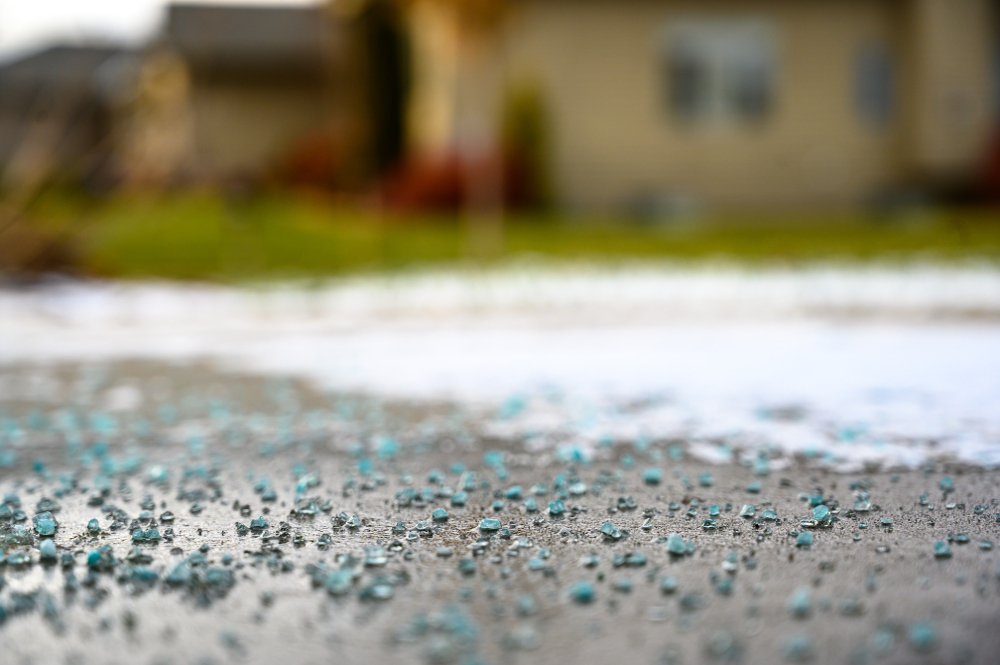 Ground,Level,Closeup,View,Of,Rock,Salt,Ice-melt,On,Concrete